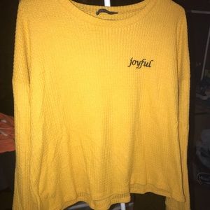 long sleeved yellow shirt